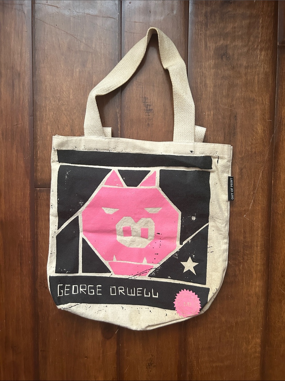 Out of Print Canvas Tote in Natural with Pink and Black Graphic